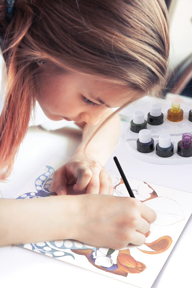 Happy young creative teenager student girl drawing sketch creati 5513904